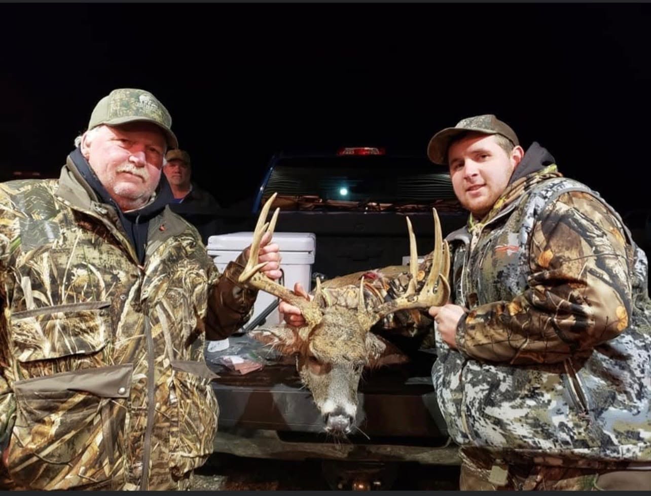 Dwayne and Dylan Nickerson with a harvested deer — D&J Custom Cutting