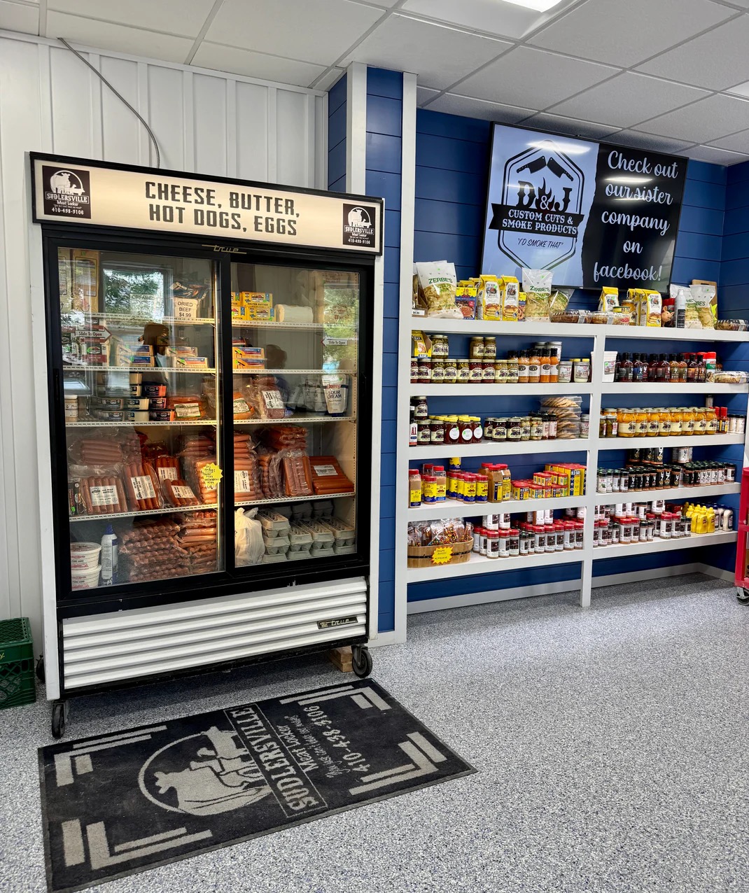 Refrigerated specialty items including cheese, butter, hot dogs and eggs at Sudlersville Meat Locker