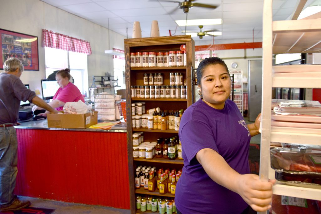 Staff at the Sudlersville Meat Locker store counter